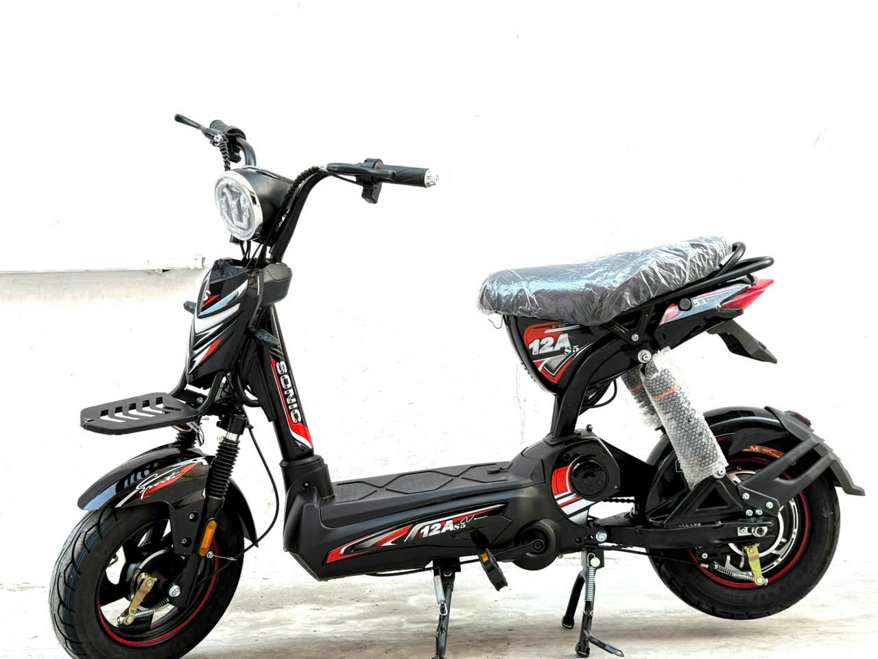 Ảnh Xe điện M133s bình ắc quy 12A có bàn đạp