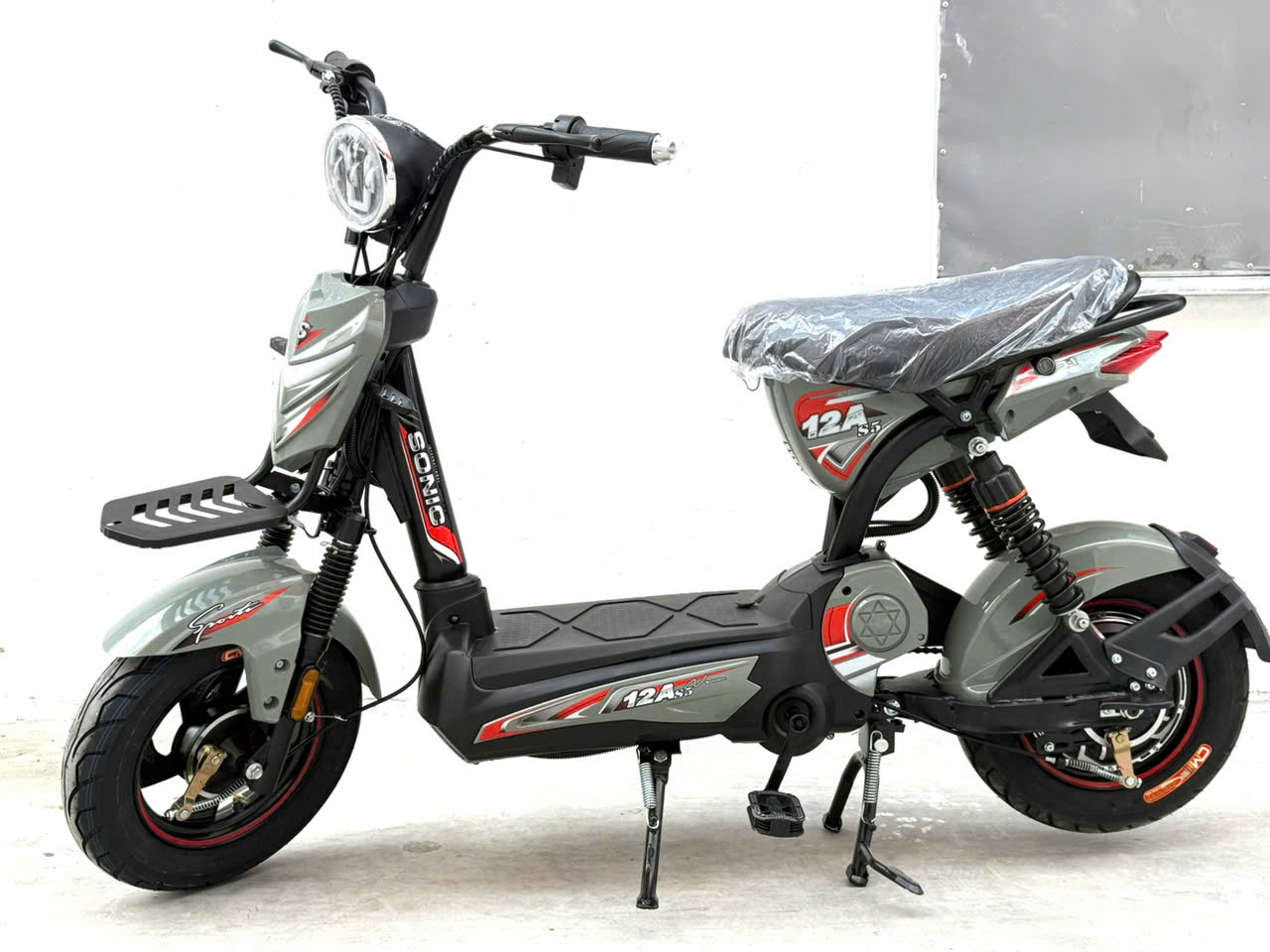 Ảnh Xe điện M133s bình ắc quy 12A có bàn đạp