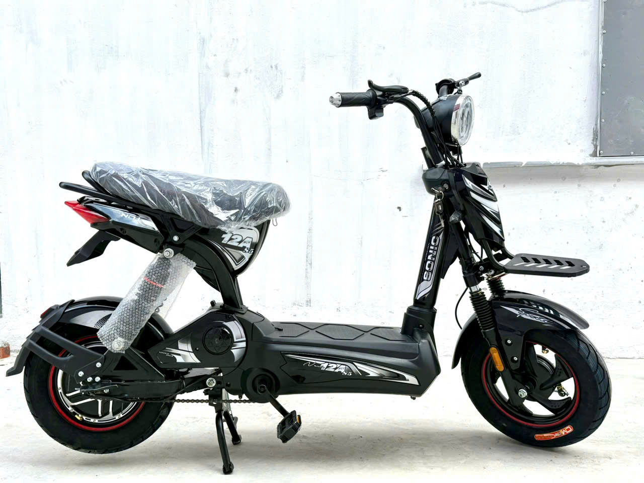 Ảnh Xe điện M133s bình ắc quy 12A có bàn đạp